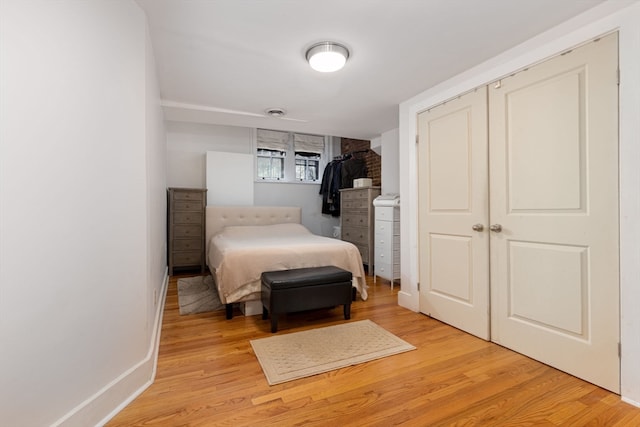 bedroom featuring light wood-type flooring