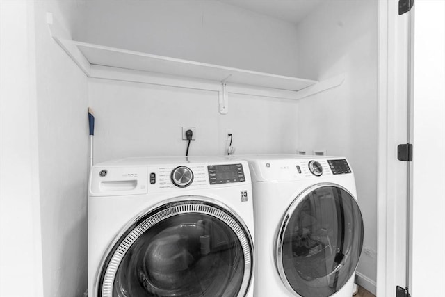 laundry room featuring independent washer and dryer