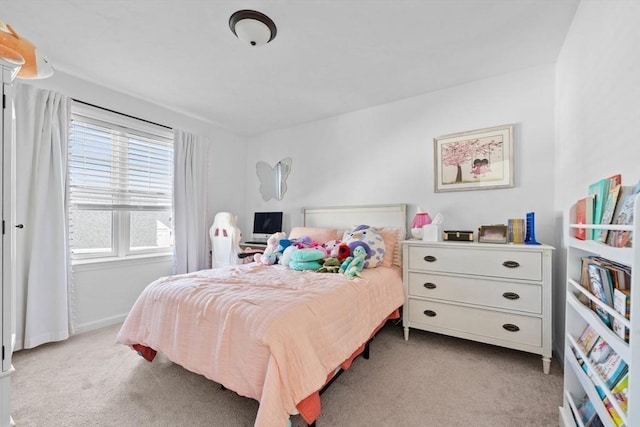 bedroom with light carpet