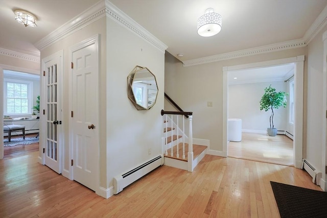 5 Taintor Dr, Sudbury, MA 01776 - hallway featuring a baseboard radiator, light wood-style flooring, and crown molding