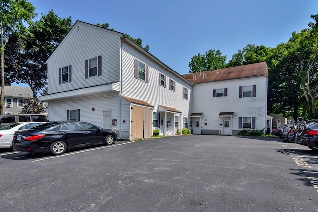 view of front of house with uncovered parking