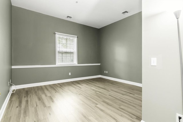 31-33 Ashland St Unit 3, Haverhill, MA 01830 - spare room with wood finished floors and baseboards