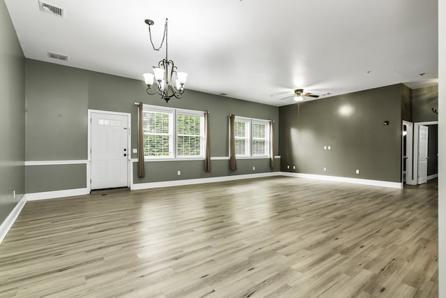 31-33 Ashland St Unit 3, Haverhill, MA 01830 - spare room with ceiling fan, baseboards, light wood-style floors, and a chandelier