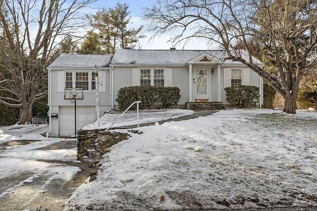 view of front of home with a garage