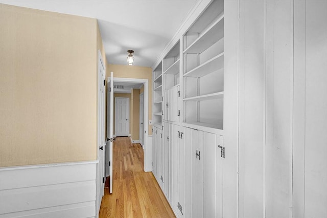 hallway featuring light wood finished floors