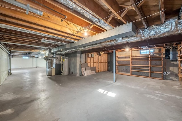 basement with water heater and heating unit