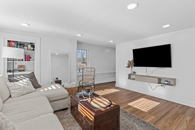 living room with wood-type flooring