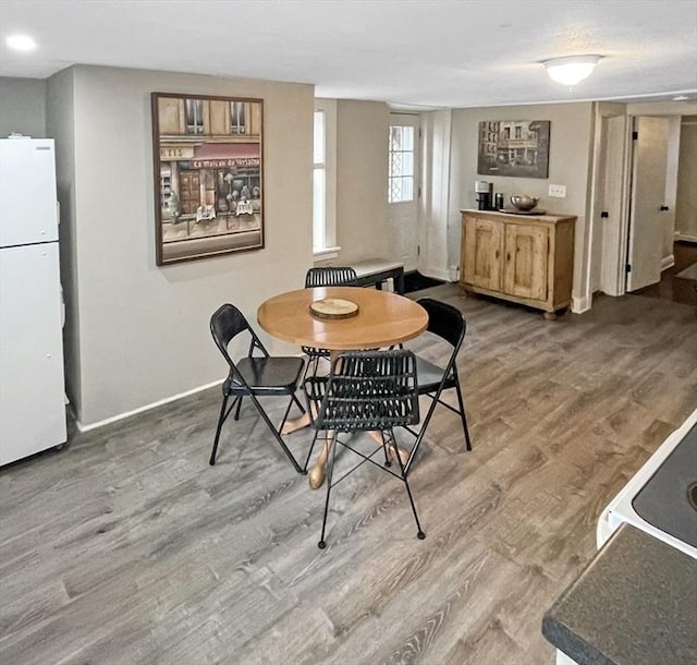 dining area featuring hardwood / wood-style floors