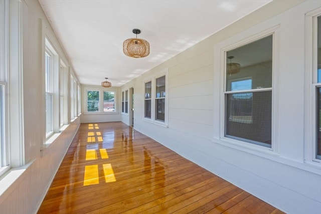 318 Newton St, South Hadley, MA 01075 - unfurnished sunroom with wood-type flooring