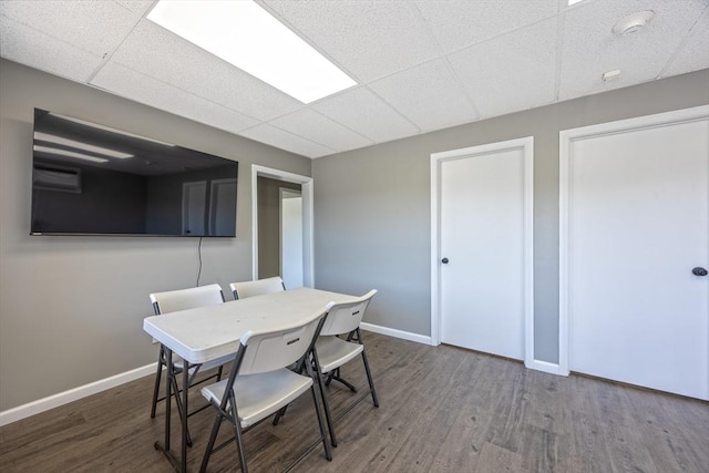 318 Newton St, South Hadley, MA 01075 - dining space with a drop ceiling, wood finished floors, and baseboards