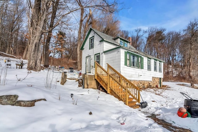 view of snow covered property