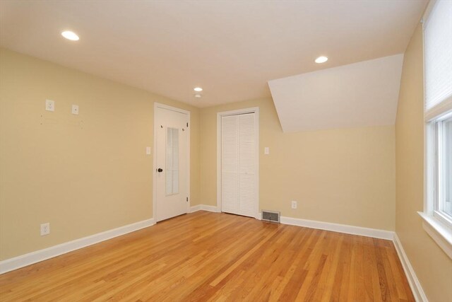 unfurnished room featuring recessed lighting, visible vents, baseboards, and light wood finished floors