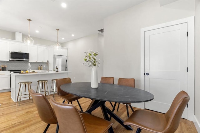 21 Ellington St Unit 3, Boston, MA 02121 - dining area with light wood-style floors and recessed lighting