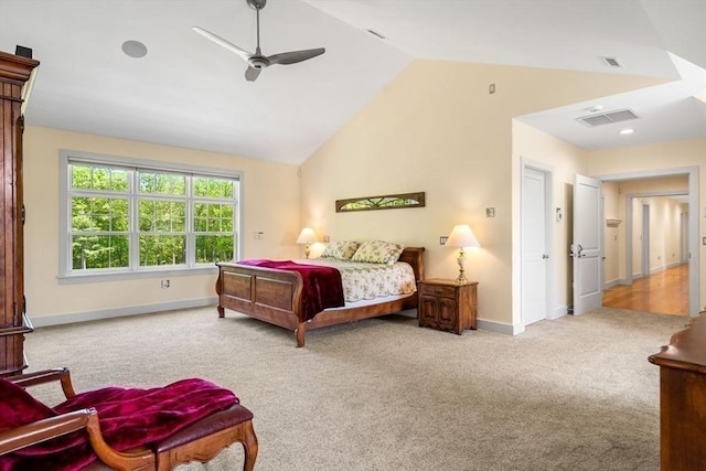 bedroom featuring carpet flooring, visible vents, baseboards, a ceiling fan, and lofted ceiling