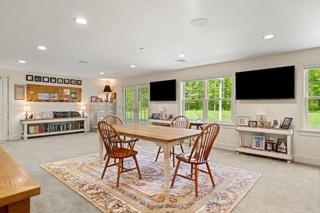 carpeted dining area featuring baseboards, visible vents, and recessed lighting