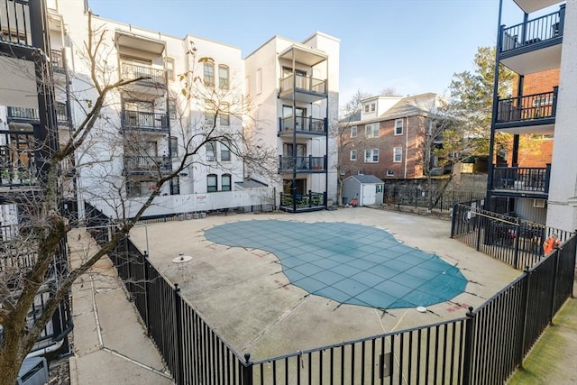 view of swimming pool with a patio area