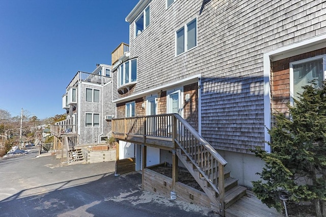 entrance to property featuring a residential view