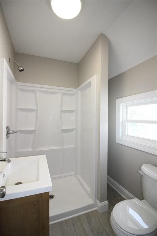 23 Walnut St, Ludlow, MA 01056 - bathroom featuring wood finished floors, a shower, and vanity