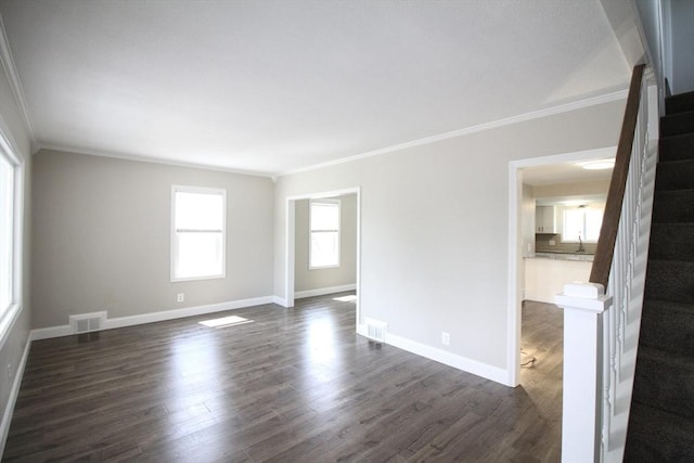 23 Walnut St, Ludlow, MA 01056 - spare room featuring ornamental molding, stairs, and dark wood finished floors