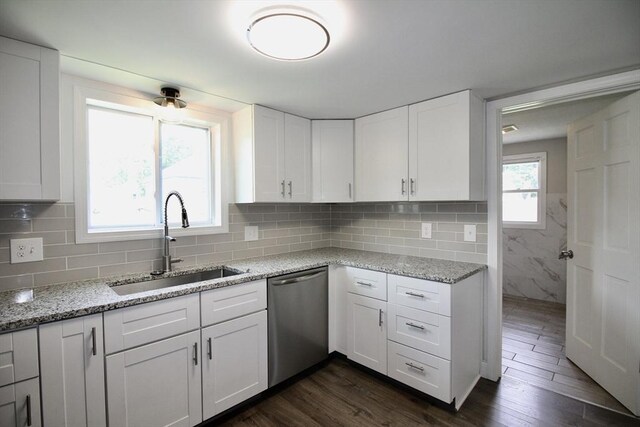 23 Walnut St, Ludlow, MA 01056 - kitchen featuring dishwasher, white cabinetry, and light stone counters