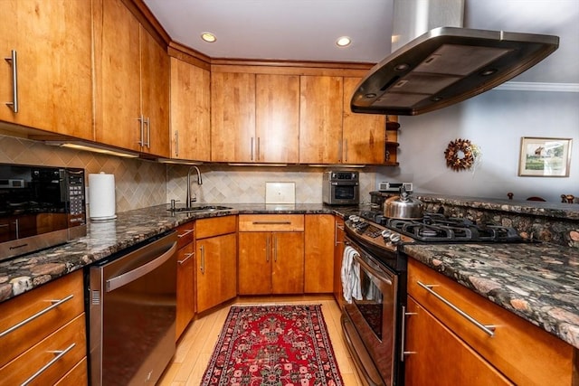 17 Ships Way Unit 17, Bourne, MA 02532 - kitchen featuring stainless steel appliances, a sink, ventilation hood, brown cabinetry, and recessed lighting