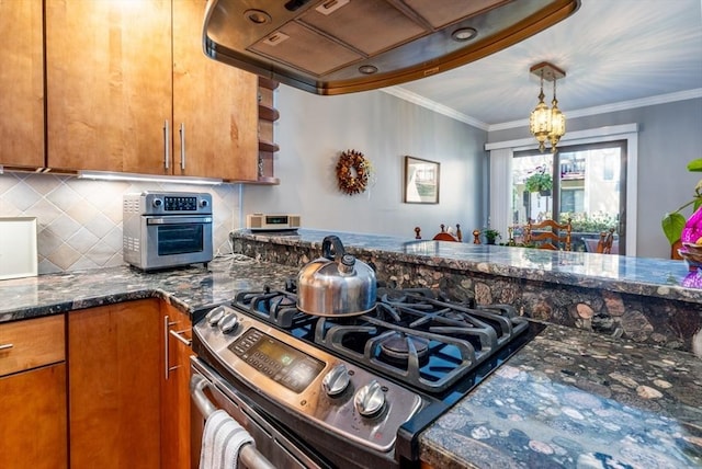 17 Ships Way Unit 17, Bourne, MA 02532 - kitchen with stainless steel gas range, open shelves, custom range hood, decorative backsplash, and dark stone countertops
