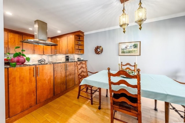 17 Ships Way Unit 17, Bourne, MA 02532 - dining area featuring light wood-type flooring, a chandelier, ornamental molding, and recessed lighting