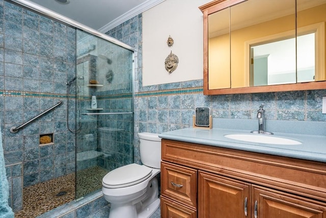 17 Ships Way Unit 17, Bourne, MA 02532 - full bath with ornamental molding, toilet, vanity, a stall shower, and tile walls