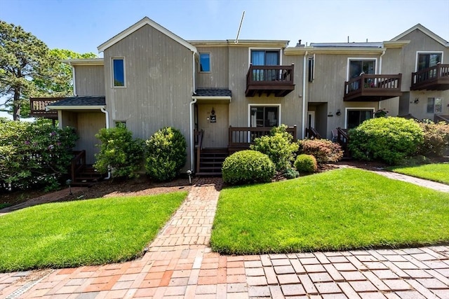 17 Ships Way Unit 17, Bourne, MA 02532 - view of property featuring a front lawn and a balcony