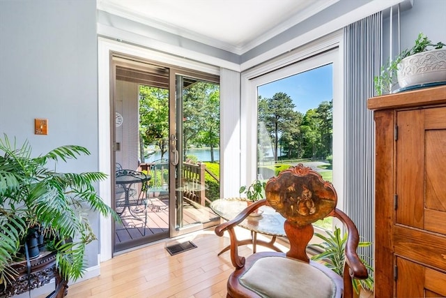 17 Ships Way Unit 17, Bourne, MA 02532 - entryway featuring ornamental molding, wood finished floors, and a water view