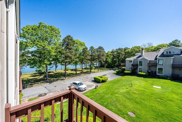 17 Ships Way Unit 17, Bourne, MA 02532 - view of green lawn with a water view and a balcony