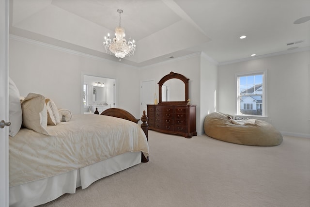 bedroom featuring carpet, ornamental molding, and a tray ceiling