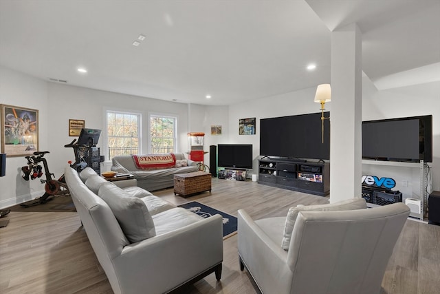 living room with light hardwood / wood-style floors