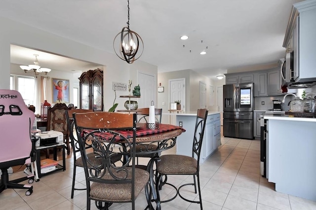 109 Macintosh Ln, Fitchburg, MA 01420 - dining area with light tile patterned flooring, a notable chandelier, and recessed lighting