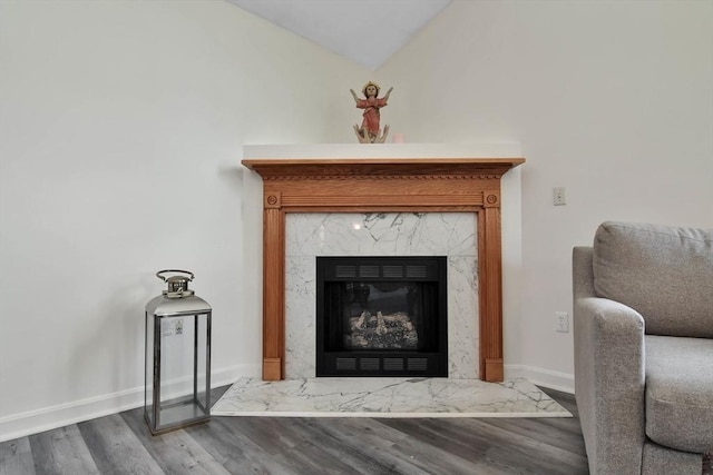 109 Macintosh Ln, Fitchburg, MA 01420 - room details featuring baseboards, wood finished floors, and a fireplace