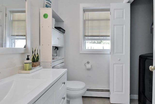 109 Macintosh Ln, Fitchburg, MA 01420 - bathroom featuring toilet, tile patterned flooring, baseboard heating, and vanity