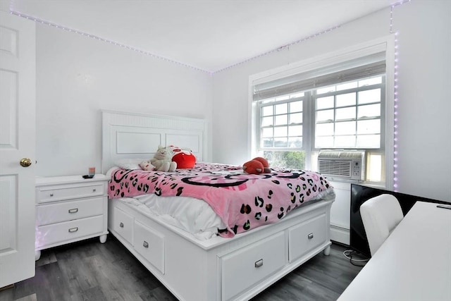 109 Macintosh Ln, Fitchburg, MA 01420 - bedroom with cooling unit, dark wood-type flooring, and a baseboard heating unit