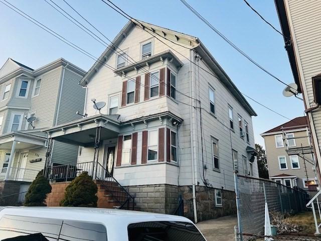 view of front of house with fence