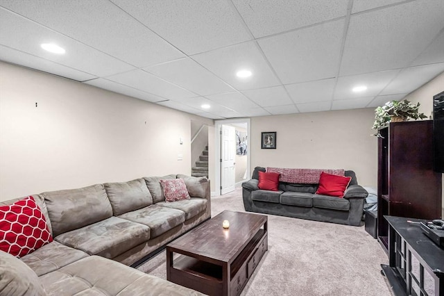 living room featuring stairway, carpet flooring, and recessed lighting