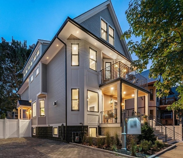34 Walker St, Somerville, MA 02144 - view of front of home featuring a balcony and a gate