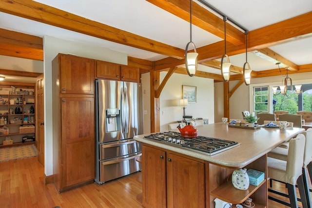 15 Allen Hill Rd, Princeton, MA 01541 - kitchen featuring stainless steel appliances, open shelves, light wood-type flooring, beamed ceiling, and decorative light fixtures