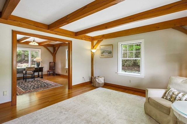 15 Allen Hill Rd, Princeton, MA 01541 - living area featuring healthy amount of natural light, wood finished floors, beamed ceiling, and baseboards