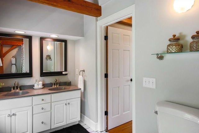 15 Allen Hill Rd, Princeton, MA 01541 - bathroom featuring double vanity, toilet, recessed lighting, and baseboards