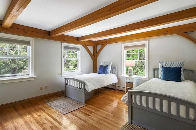 15 Allen Hill Rd, Princeton, MA 01541 - bedroom featuring light wood-style floors, beamed ceiling, baseboard heating, and baseboards