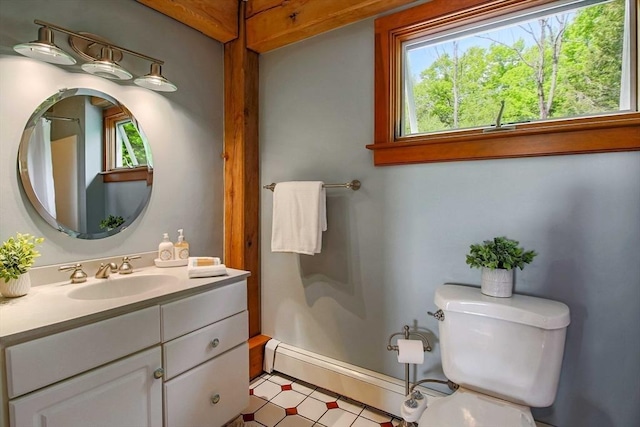 15 Allen Hill Rd, Princeton, MA 01541 - bathroom with healthy amount of natural light, toilet, a baseboard heating unit, and vanity