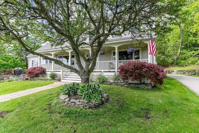 15 Allen Hill Rd, Princeton, MA 01541 - view of front of house featuring a porch, a front yard, and asphalt driveway