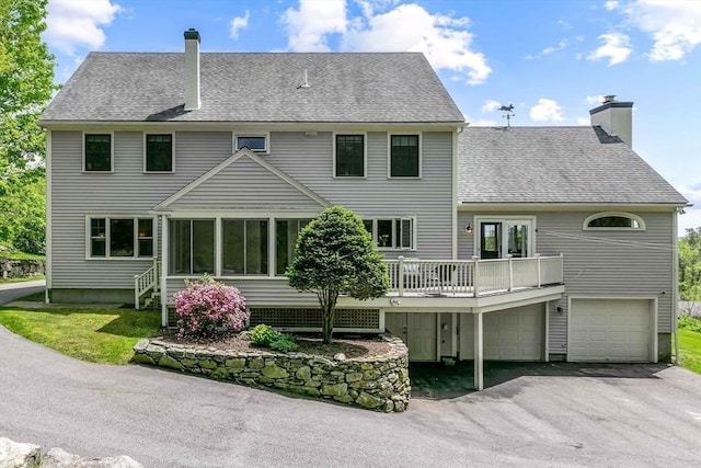 15 Allen Hill Rd, Princeton, MA 01541 - back of property with a chimney, a shingled roof, asphalt driveway, and a garage