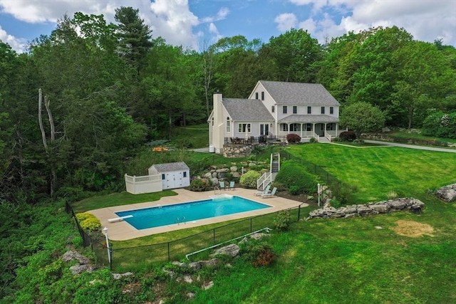 15 Allen Hill Rd, Princeton, MA 01541 - rear view of house featuring a view of trees, an outdoor pool, stairway, a chimney, and a patio area