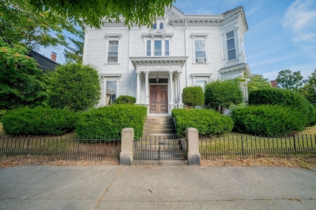 view of front of property featuring cooling unit