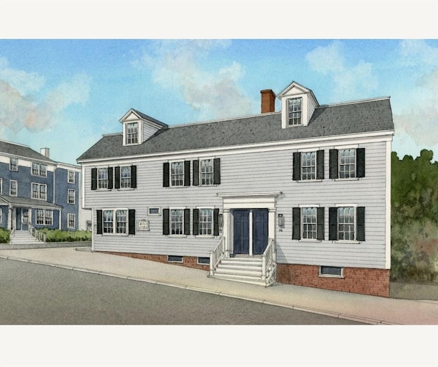 view of front of house with entry steps and a chimney